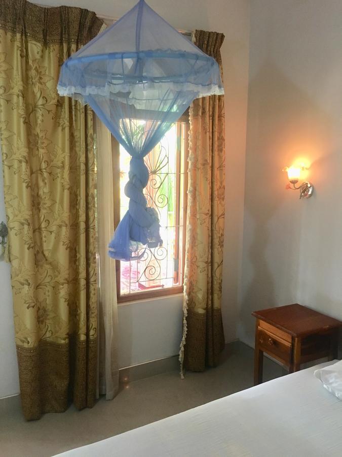 New Land Guest House 拜蒂克洛 外观 照片