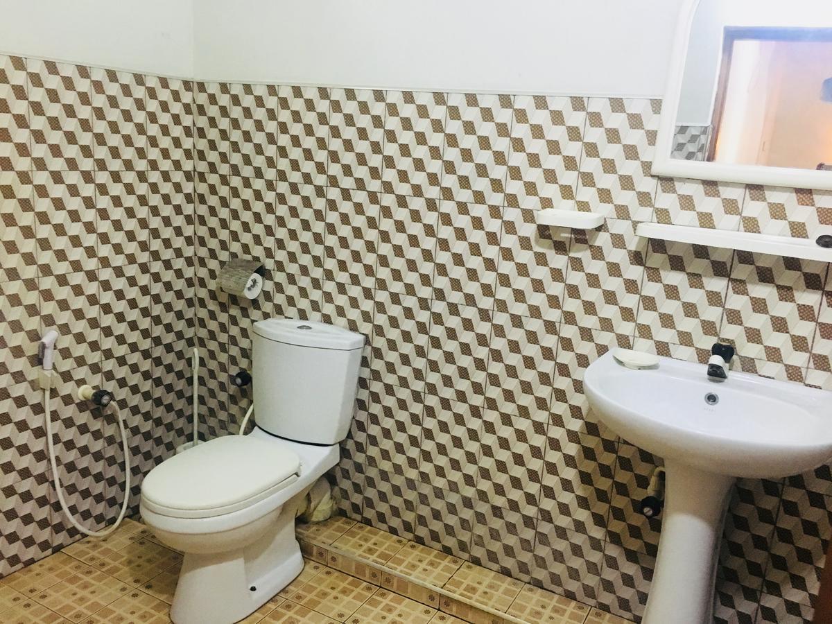 New Land Guest House 拜蒂克洛 外观 照片